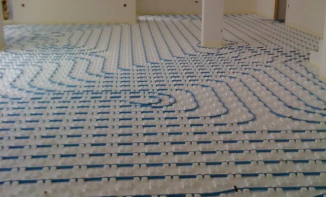 Pose des tubes pour le  plancher chauffant 